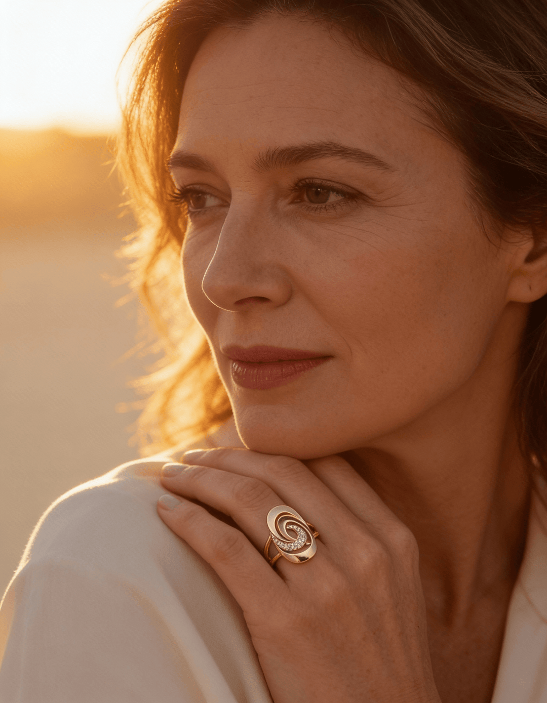 Elegant Gold Spiral Cubic Zirconia Ring