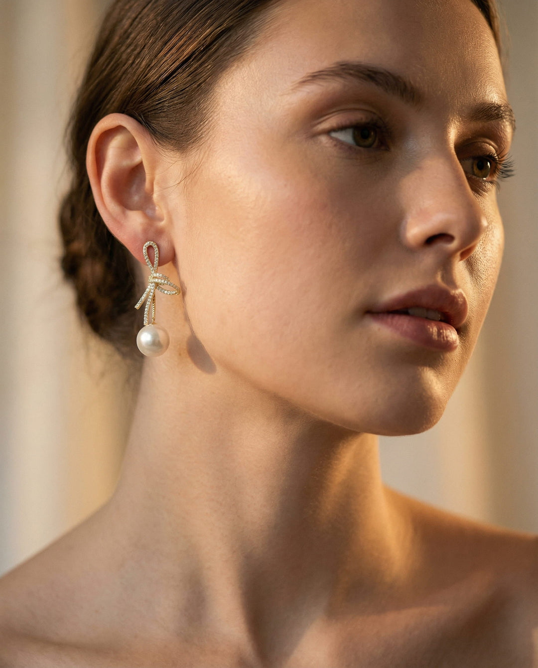 Gold Sparkling Bow Pearl Earrings
